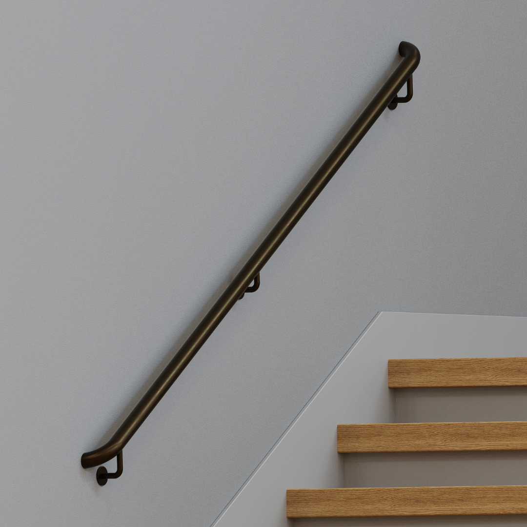 Wall Mounted Stainless Steel handrail ADA Compliant in bronze powder coat color mounted above stairs.